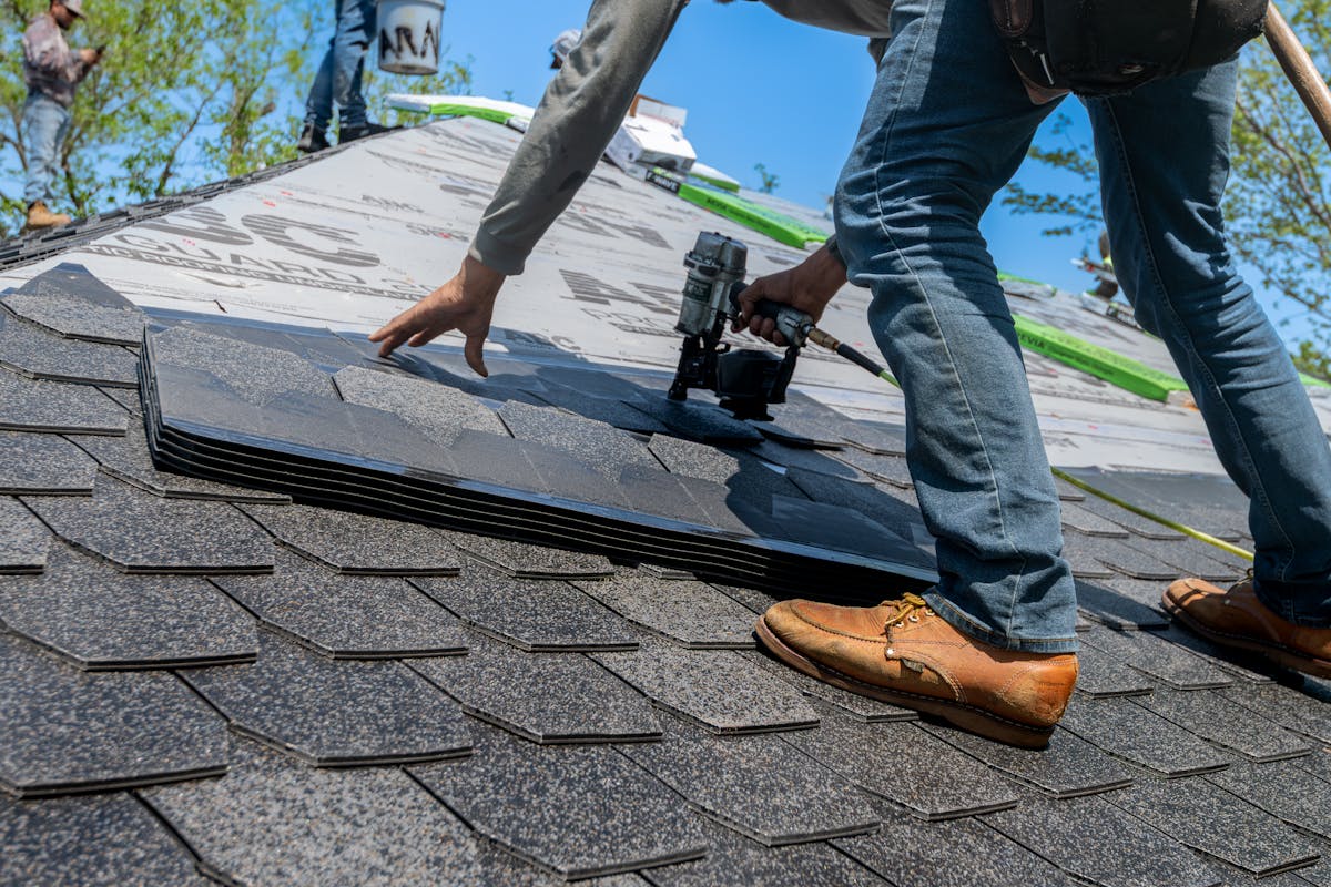 Standing-seam metal roof on a residential home showing parallel ridge pattern